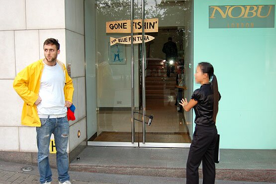 Nobu staff member talking to Aidan Brown outside the restaurant